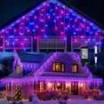 thumbnail image 1 of Cascada de Luces Navideñas 10M 400 LEDs, Series de Luces Navideñas 8 Modos, Temporizador y IP44 Impermeable Luz Cascada Exterior Navidad para Decoración, Balcone, Jardin/Fiesta, Azul y Morado, 1 of 8