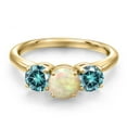 thumbnail image 3 of Gem Stone King 18K Yellow Gold Plated Silver White Ethiopian Opal and Blue Moissanite Engagement Ring for Women | 1.56 Cttw | Round Cabochon 6MM | Gemstone October Birthstone | Size 8, 3 of 6