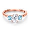 thumbnail image 3 of Gem Stone King 18K Rose Gold Plated Silver White Moissanite and Swiss Blue Topaz Engagement Ring for Women | 1.30 Cttw | Oval 7X5MM | Gemstone Birthstone | Size 5, 3 of 7