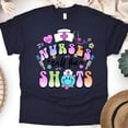 thumbnail image 1 of Nurses Call The Shots T-Shirt | Funny Nurse Graphic Tee with Syringe Design, Navy, Size 2XL, 1 of 6