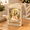 Book Beige, variant on Carriage Shaped Christmas Snow Globe with Music Box and Lights
