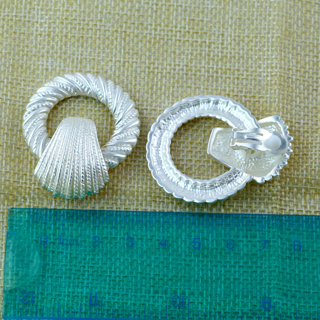 Boucles D'oreille Clip Ou Percée Avec Nœud En Métal Argenté - Sans Nickel