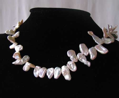 Rose Petal From 11x8x4mm to 22x8x3mm Creamy White Keishi FW Pearl Strand 109945D