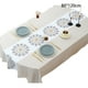 thumbnail image 2 of Se producen flores de colores vivos bordadas con un mantel ovalado de color blanco cremoso., 2 of 5