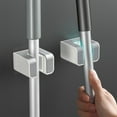 thumbnail image 1 of Soporte de Pared para Trapeador | Adhesivo Resistente Sin Perforaciones | Clip Resistente para Ducha y Cocina | Sujeta Escobas y Trapeadores | Abs Impermeable | Gris o Negro, 1 of 6