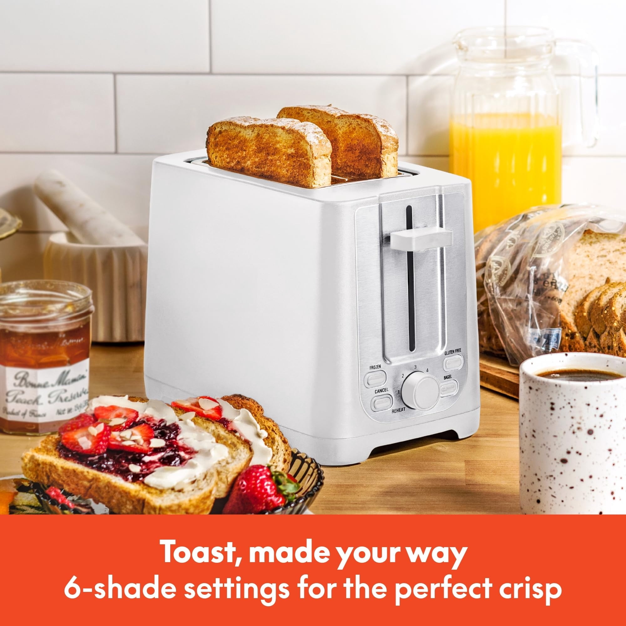 Double-slot toaster with automatic shut-off - extra-wide slots, removable crumb tray, and cancel, defrost, and reheat functions - can toss bread, bagels, and waffles.