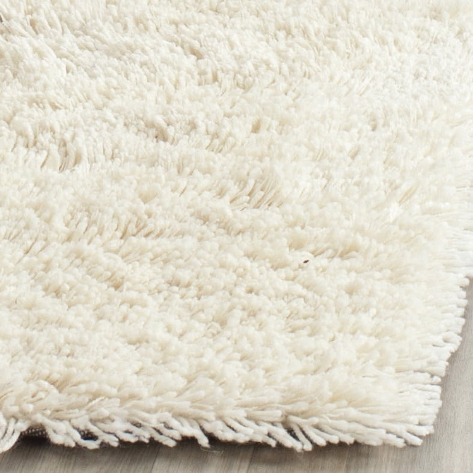 SAFAVIEH Glen Solid Plush Shag Area Rug, Ivory, 7'6" x 9'6"