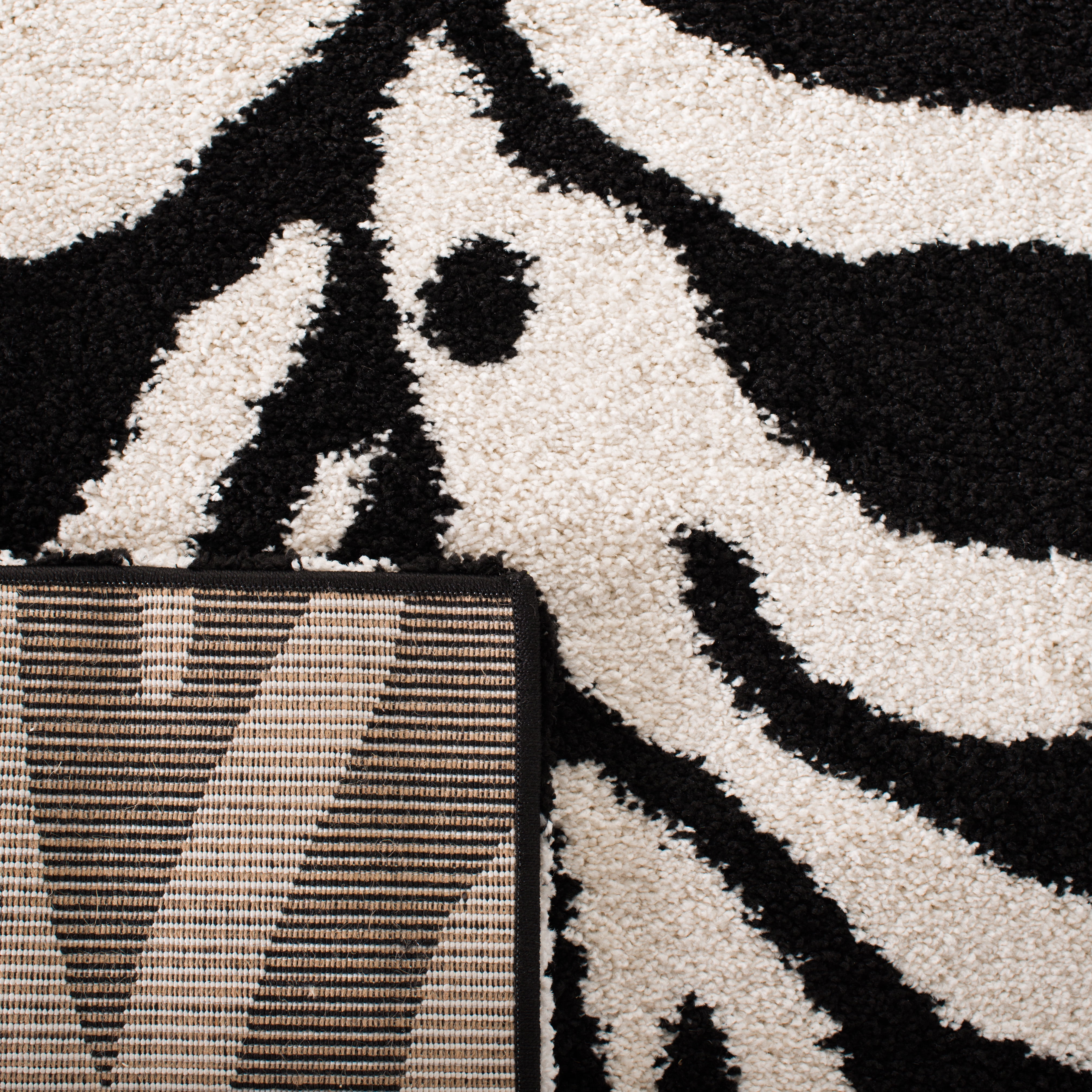 SAFAVIEH Florida Eleanor Animal Shag Runner Rug, Ivory/Black, 2'3" x 19'