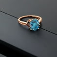 thumbnail image 4 of Gem Stone King 18K Rose Gold Plated Silver London Blue Topaz and Black Diamond 3 Stone Ring for Women (3.03 Cttw, Oval 10X8MM, Gemstone November Birthstone, Size 9), 4 of 4