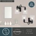 thumbnail image 5 of Northbrook 2-Light 16 in. Wide Matte Black Traditional Bathroom Vanity Lighting Fixture, Clear Seeded Cylinder Glass Shade, Dimmable, LED Compatible, Over the Mirror Mounted Steel Wall Sconce, 5 of 11