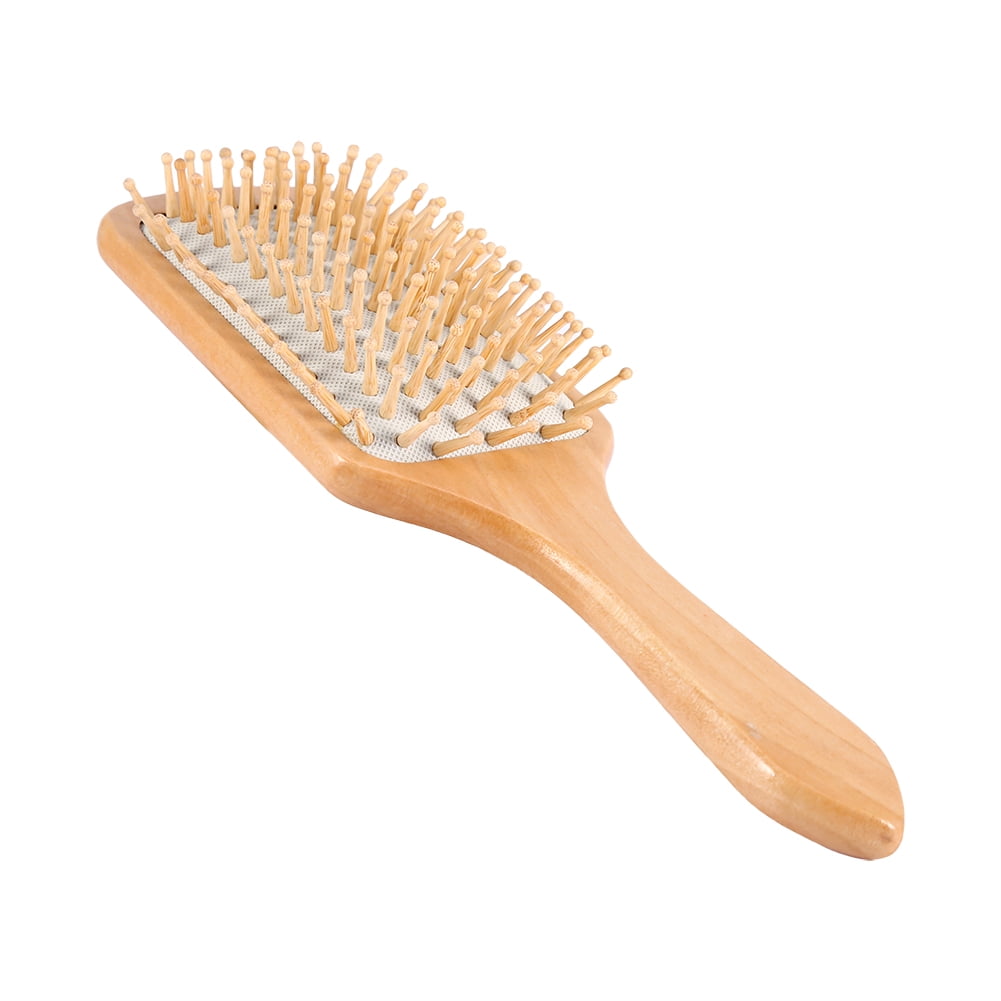brosse en bois cheveux bouclés