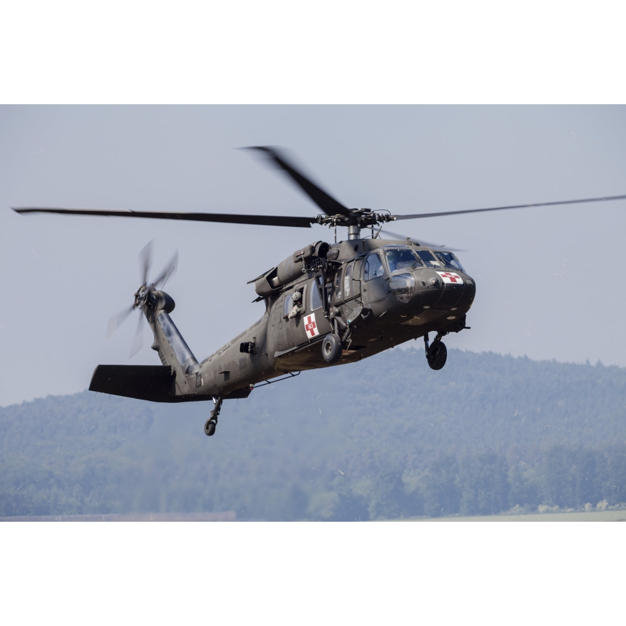 UH-60A Black Hawk medevac helicopter of the US Army Canvas Art - Timm ZiegenthalerStocktrek Images (34 x 23)