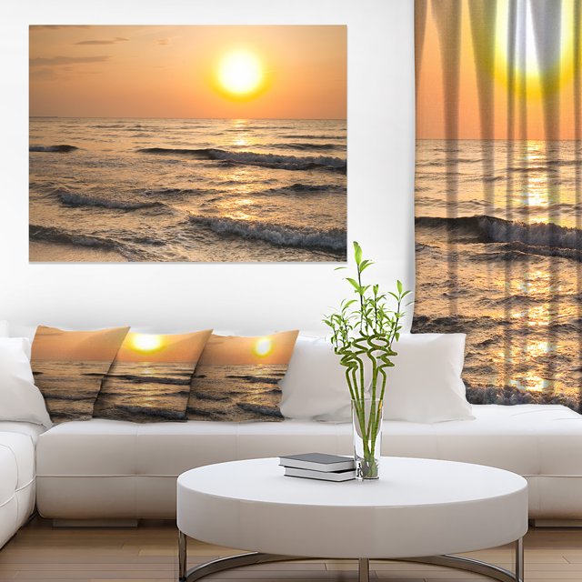Typical Sunrise with Tranquil Waves