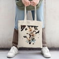 thumbnail image 2 of Stylish Natural Canvas Tote Bag with White Flowers & Yellow Centers on Dark Abstract Background - Perfect for Shopping & Travel, 2 of 4