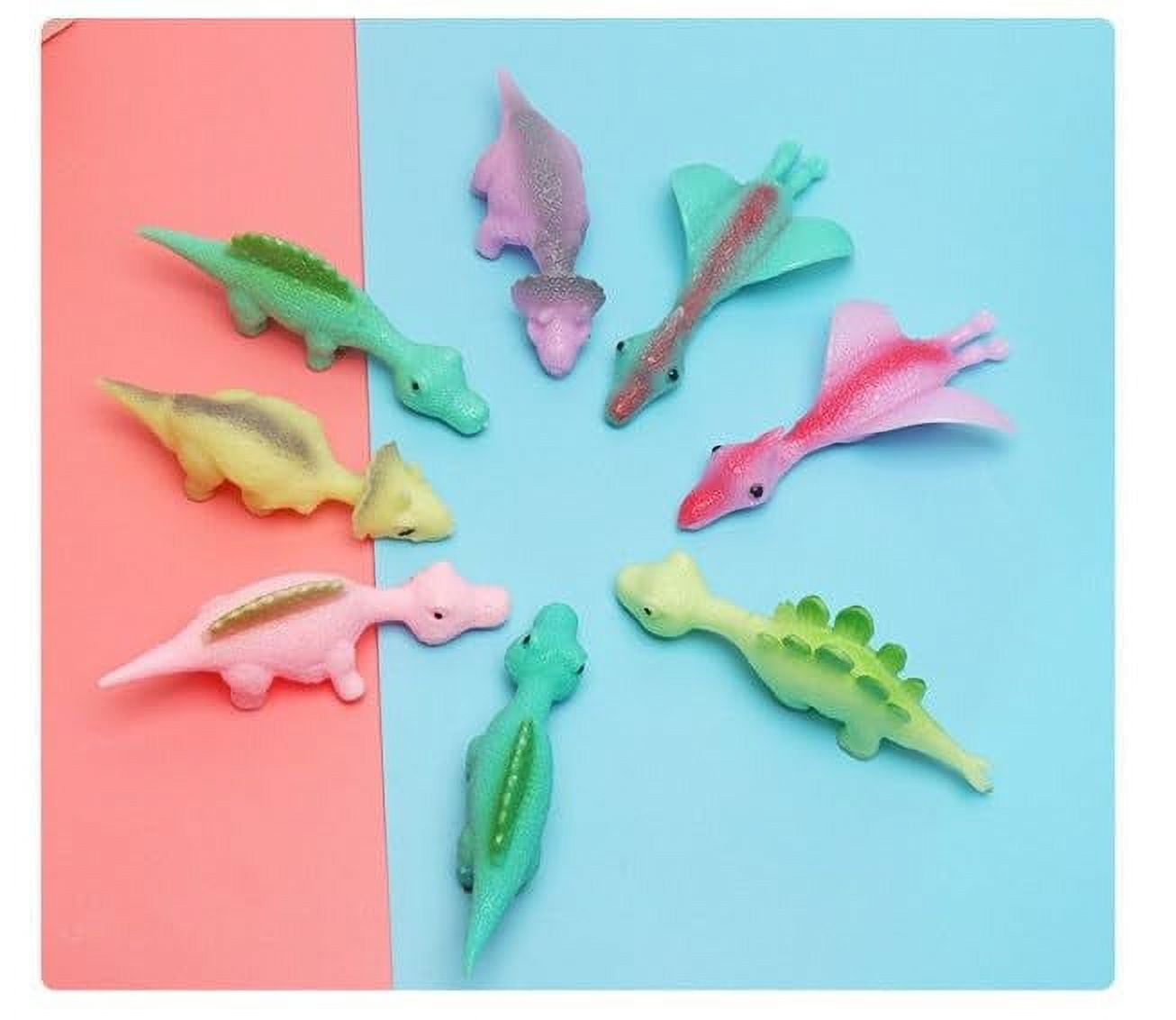 JUZIGUNIANG Slingshot Dinosaur Finger Toys, Lot de 30 Jouet de Doigt de  Dinosaure de Fronde, Jouet élastique en Caoutchouc Dinosaure Volant  Nouveauté