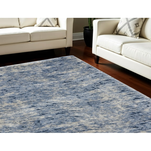 7' X 9' Light Blue Navy Blue and Beige Abstract Shag Area Rug