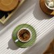 thumbnail image 4 of Posavasos de silicona NOGIS para bebidas con soporte, con diseño acanalado, base antideslizante, lavables y resistentes al calor, para mesa, cocina, oficina y bar (verde, paquete de 6), 4 of 6