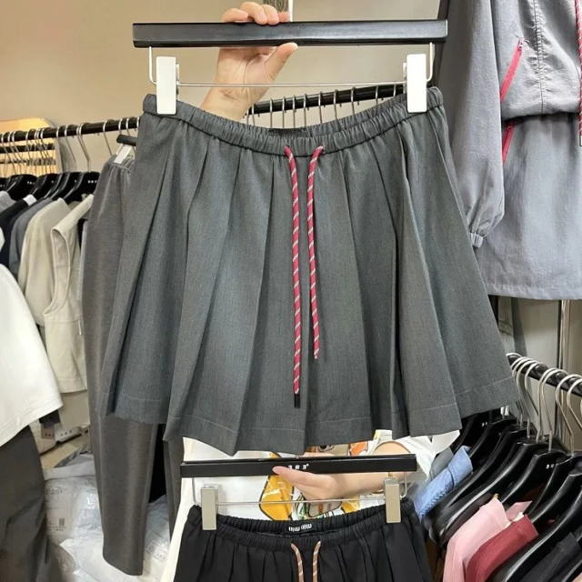 Minivestido adelgazante de cintura alta para mujer, estilo preppy, falda plisada con cordón, otoño de 2024, falda Jk reductora de edad