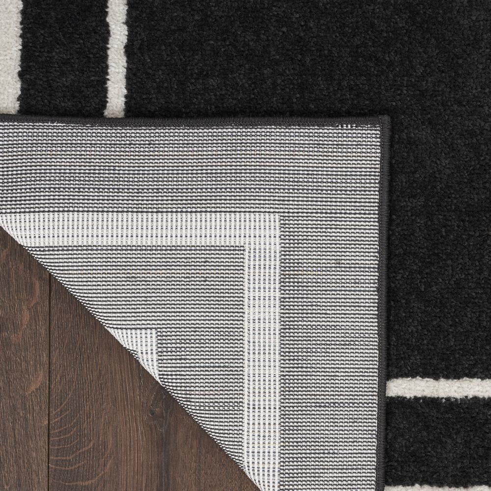 Nourison Essentials Indoor/Outdoor Black Ivory 5' x 7' Area Rug, (5x7)