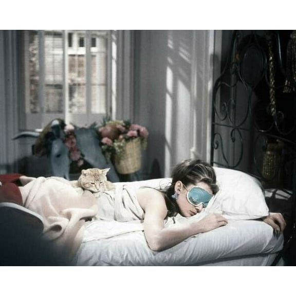 Audrey Hepburn wears sleep mask in bed with cat Breakfast at Tiffany's poster