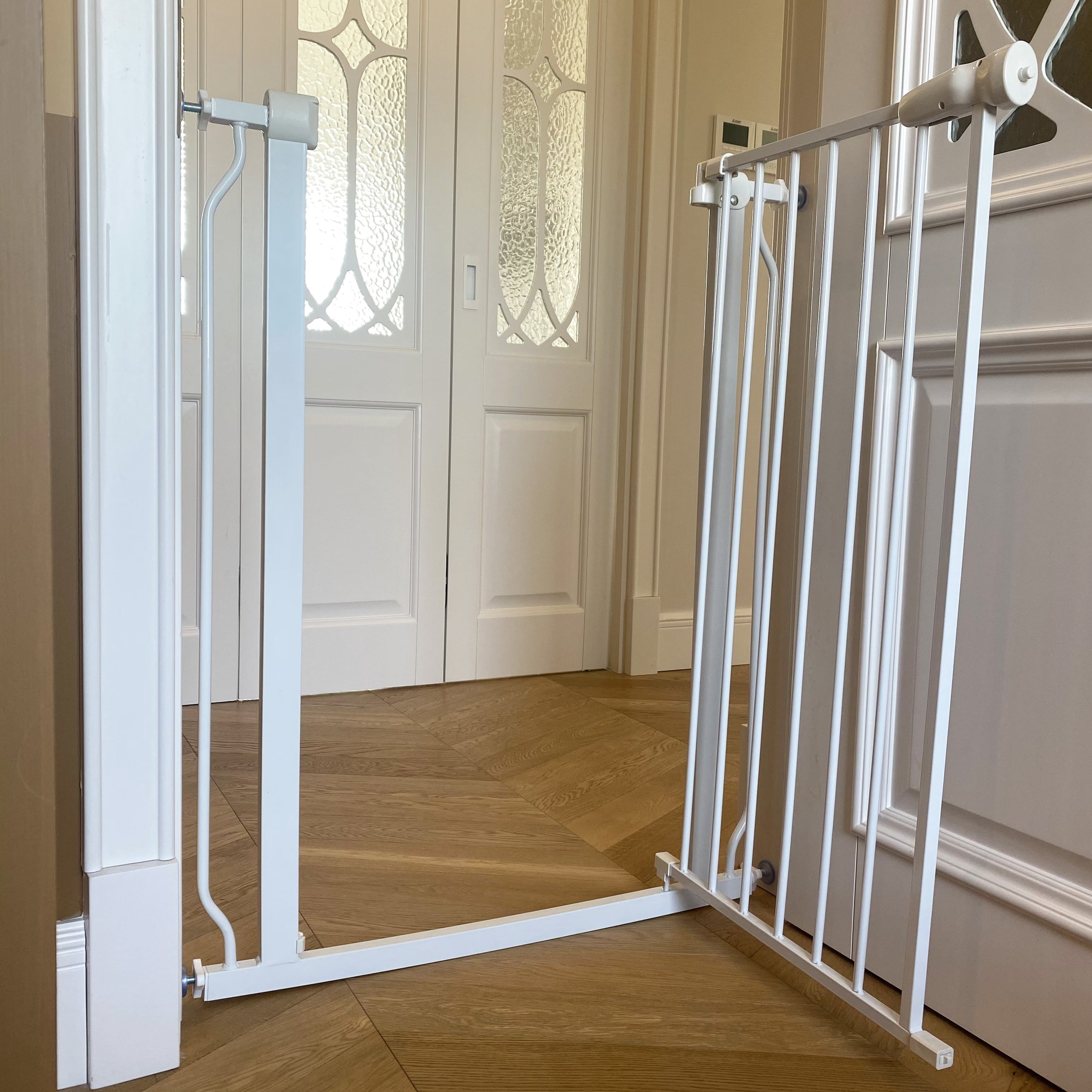 Elevon Easy Walk Through Safety Gate for Doorways and Stairways with Auto Close and Hold Open Features with Wall Caps, Fits Opening Between 29.1 to 33.8 Inches, 36-Inch High