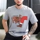 thumbnail image 3 of Camisetas con estampado navideño de Moo Deng para hombre, camiseta informal transpirable, camiseta de manga corta para mujeres y hombres, camisetas gráficas navideñas, 3 of 5
