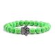 thumbnail image 1 of Pulsera con dije de huella de pata de piedra volcánica de lava negra mate natural, ideal como recuerdo para mascotas, amantes de los gatos y los perros., 1 of 2