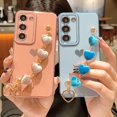 thumbnail image 5 of Phone Case for Samsung Galaxy A13 5g 6.5" with Elegant Heart Bracelet Strap Luxury Plating Cute Love Heart Cover with Hand Chain for Women Camera Protection Soft Shockproof Bumper (Pink), 5 of 12