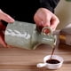 thumbnail image 5 of Bearachild Botella de aceite con tapón de corcho, a prueba de fugas, dispensador preciso para aceite de oliva, vinagre y zumo de limón, ideal Cocina y Comedor blanco, 5 of 6