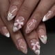 thumbnail image 1 of Uñas postizas blancas francesas, prensas medianas, almendras, flores en 3D, lazo acrílico con forma, 1 of 6