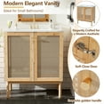 thumbnail image 2 of The 30-inch bathroom vanity is made of natural materials and features handmade rattan doors with soft-close mechanisms, offering elegance, ample storage space, and durability., 2 of 9