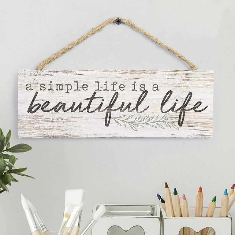 Some things in life are meant to be simple so you can DIY too! This wood  sign not only welcomes but can be customized on how it's hung as well. A  couple
