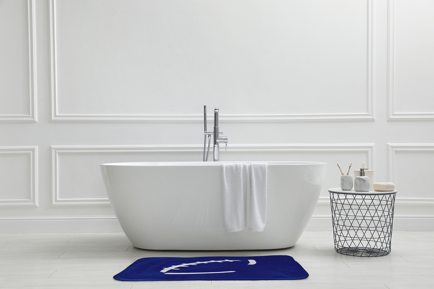 Simply Daisy 34" x 21" Plush Microfiber Blue Football Bath Mat
