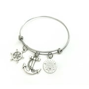 Nautical themed bracelet. Includes Anchor, Ship Wheel, and lighthouse. Marine gift, Beach House Hostess Gift.