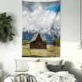 thumbnail image 3 of Wyoming Tapestry, Landscape of Old Rustic Wooden Cottage and Snowy Mountains with Fluffy Heavy Clouds, Wall Hanging for Bedroom Living Room Dorm Decor, 60"W X 80"L, Multicolor, by Ambesonne, 3 of 5