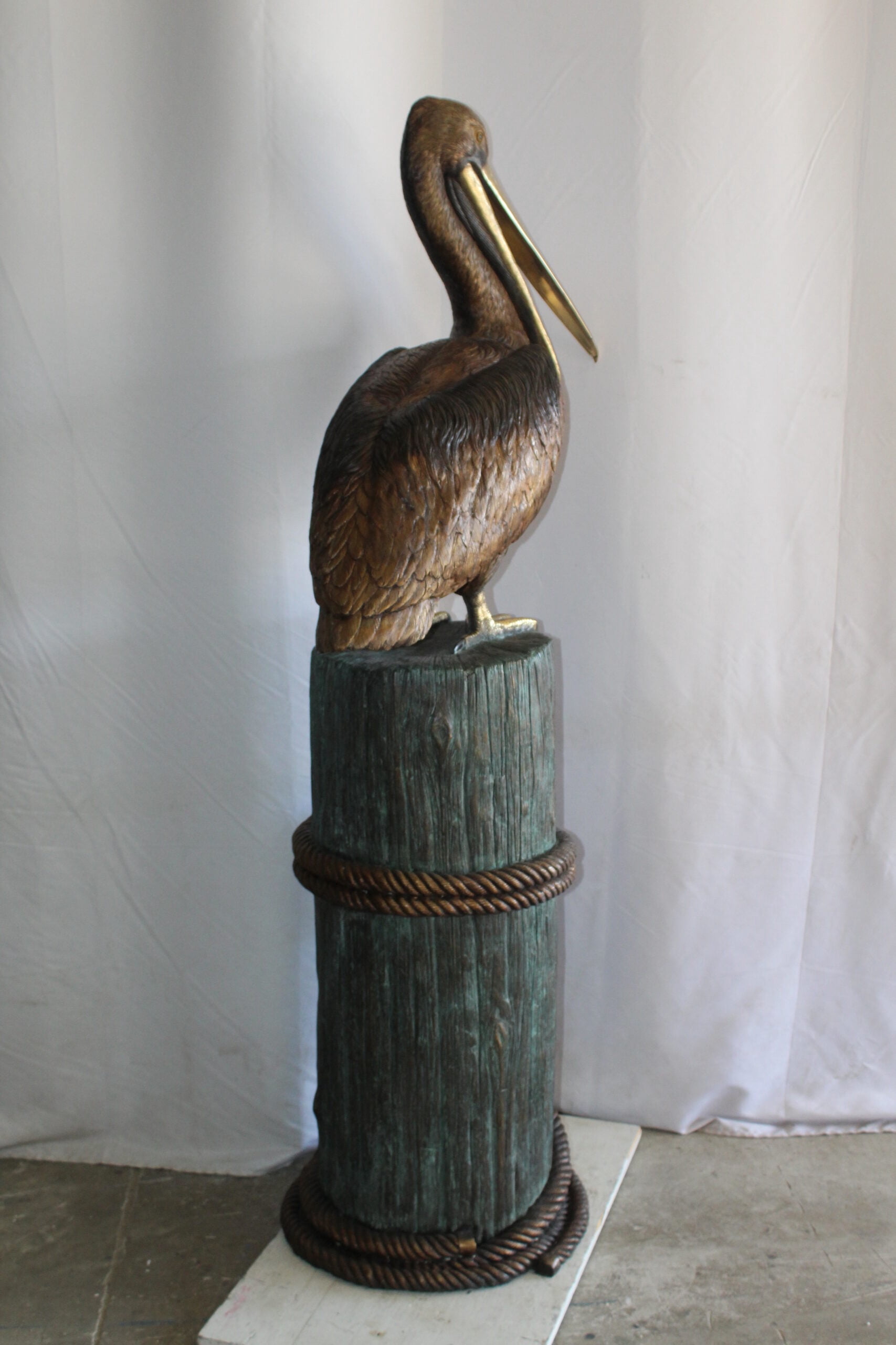 Nifao Pelican Outdoor Fountain Statue Mounted on Tree Stump, Lifesize Bronze Garden Water Feature for Patio & Yard – Garden Outdoor Decor Sculpture, 33"L x 23"W x 73"H