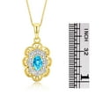 thumbnail image 4 of RYLOS Matching Set 14K Yellow Gold Floral Pattern Halo Pendant Necklace & Ring. Gemstone & Diamonds, 18" Chain. 6X4MM Blue Topaz December Birthstone; Size 7, 4 of 9