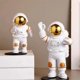 thumbnail image 3 of Juego de 3 estatuas de astronauta doradas y blancas, figuras de escultura del espacio exterior para decoración del hogar, adornos para tartas, 3 of 5