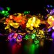 thumbnail image 2 of Guirnalda de luces LED solares impermeables, 20 LED con 8 diseños de mariposas, 5 m, multicolor, para exteriores [Clase energética A+], 2 of 4