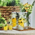 thumbnail image 6 of ZHUYING Set of 4 Glass Carafe with Lid, 1 Liter Beverage Serveware Carafe, Clear Glass Pitcher for Mimosa Bar, Brunch, Cold Water, Juice, Milk, Iced Tea, Lemonade, 6 of 8