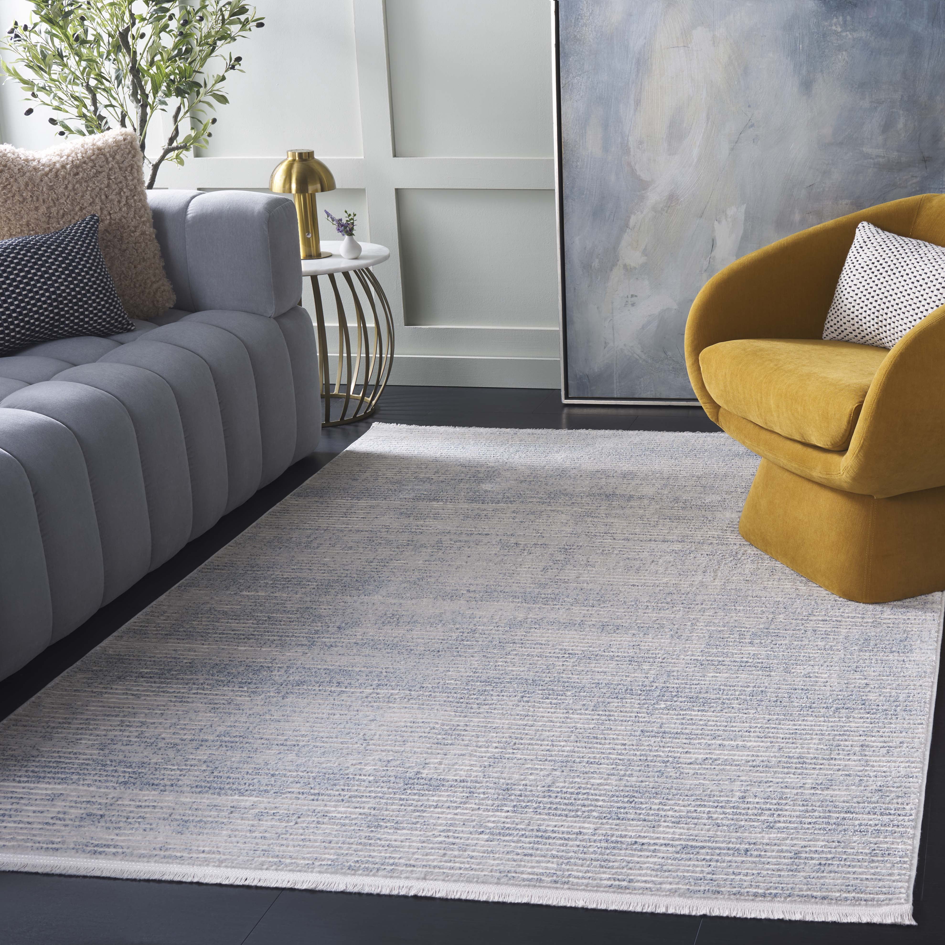 SAFAVIEH Whisper Zoe Solid Area Rug, Blue/Grey, 5'3" x 7'6"