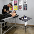thumbnail image 4 of YIYIBYUS Tattoo Workbench Stand, Professional Adjustable Tattoo Table with Storage & Cup Holder, Heavy-Duty Stainless Steel Tripod Design for Tattoo Artists, Home Studio, Salon or Clinic, Black, 4 of 17