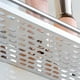 thumbnail image 3 of Estante flotante de malla para cocina, organizador de pared de acero inoxidable de estilo moderno que ofrece soluciones de almacenamiento a prueba de óxido en baños y sanitarios (multiusos), 3 of 7