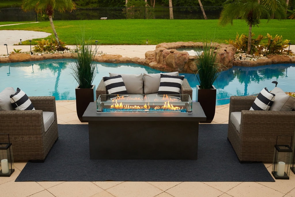 AKOYA Outdoor Essentials – 60" Rectangular Chat Height Outdoor Propane Gas Concrete Smokeless Fire Pit for Patio, Table with Glass Guard and Crystals in Gray (Amber)