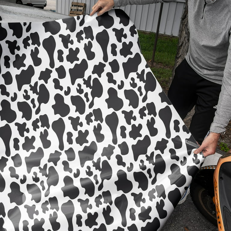 Vinyl rug with cow print