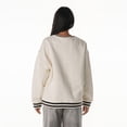 thumbnail image 2 of Women's The Wild Collective Cream Cleveland Browns Oversized Vintage French Terry Sweatshirt, 2 of 2