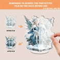 thumbnail image 3 of A rotating acrylic display piece featuring detailed Snow and Frost Elves with icy colors and intricate designs, enhanced by cinematic lighting and rich decorations, 3 of 6