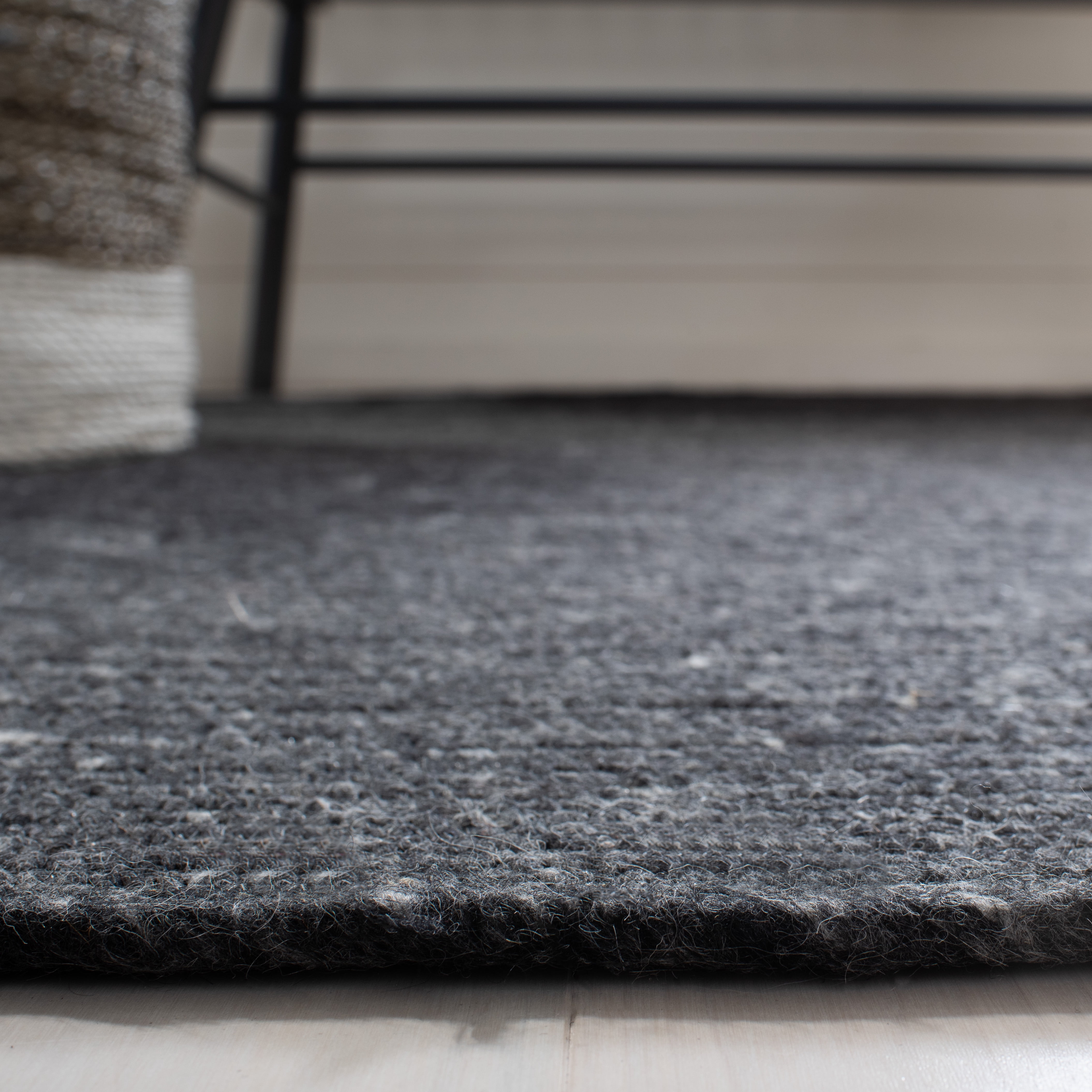 SAFAVIEH Braided Ronan Solid Reversible Area Rug, Black, 5' x 7' Oval