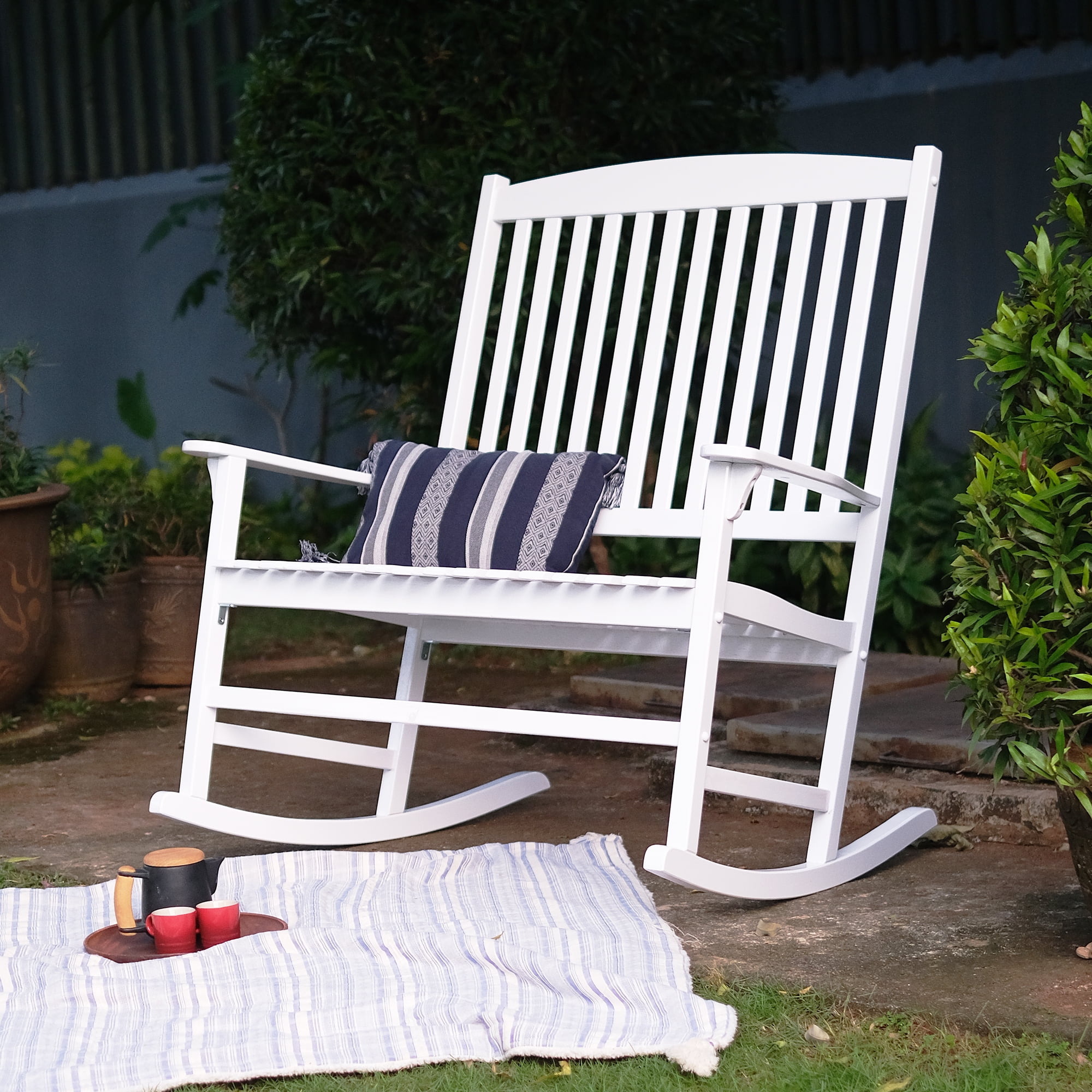 two outdoor rocking chairs