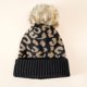 thumbnail image 5 of FeiKong Gorro de punto con borde acanalado y protección para las orejas, gorro de punto con estampado de leopardo y bola de felpa para otoño e invierno, para ciclismo, 5 of 5
